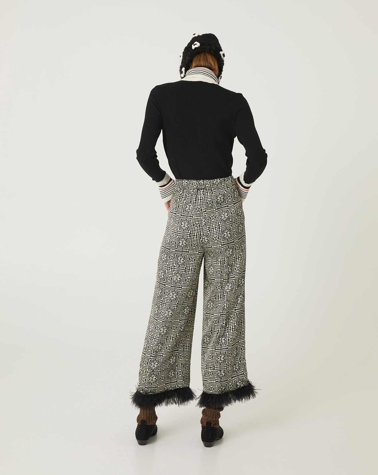 printed trousers with feathers