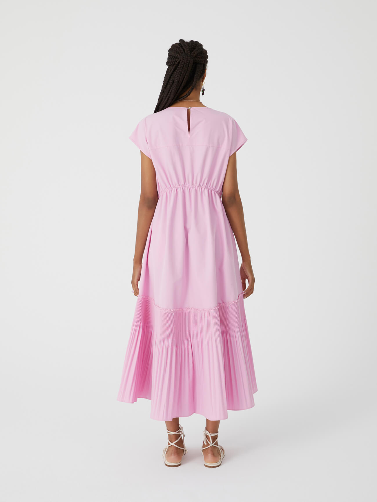 pink dress with ruffles on the bottom