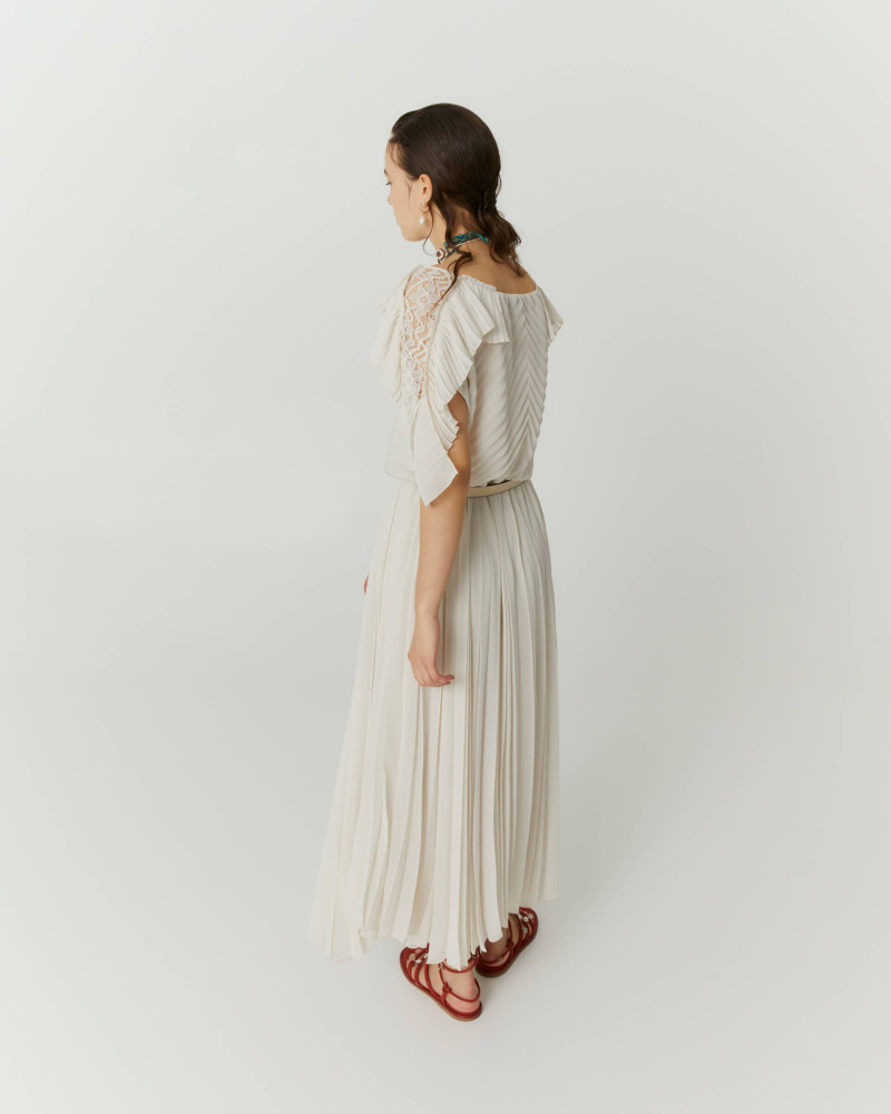 pleated dress with ruffles and lace