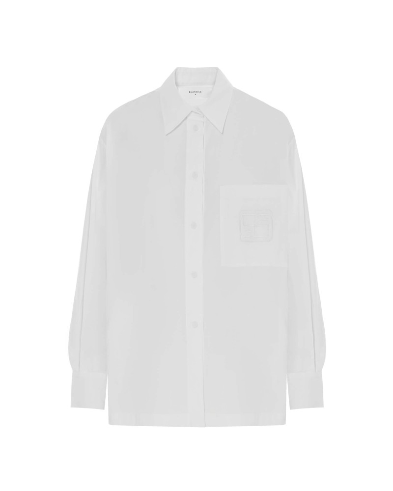camicia bianca oversize con spacchi