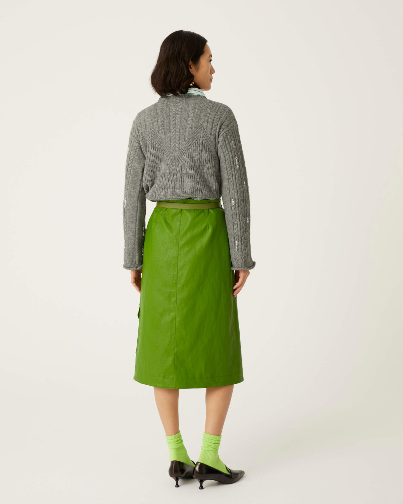 green eco-leather skirt with maxi pockets