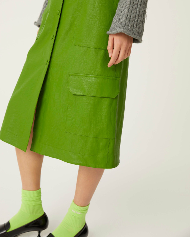 green eco-leather skirt with maxi pockets